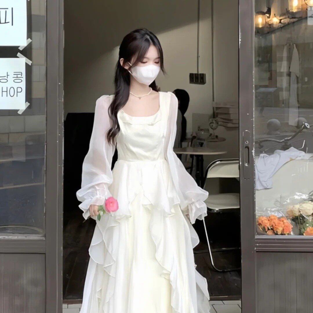 法式温柔白色荷叶边连衣裙仙女秋冬气质高级感生日在逃公主长裙子