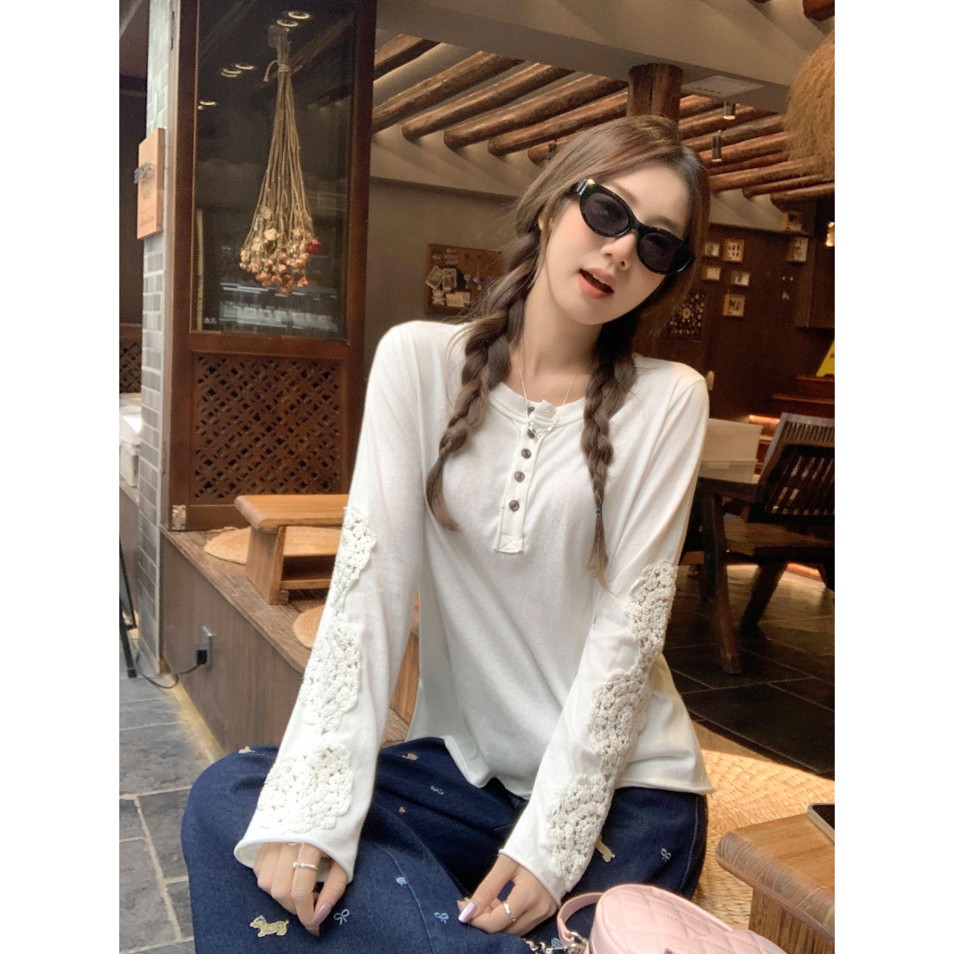 慵懒风重工刺绣镂空长袖T恤女2025年早秋新款纽扣宽松设计感上衣