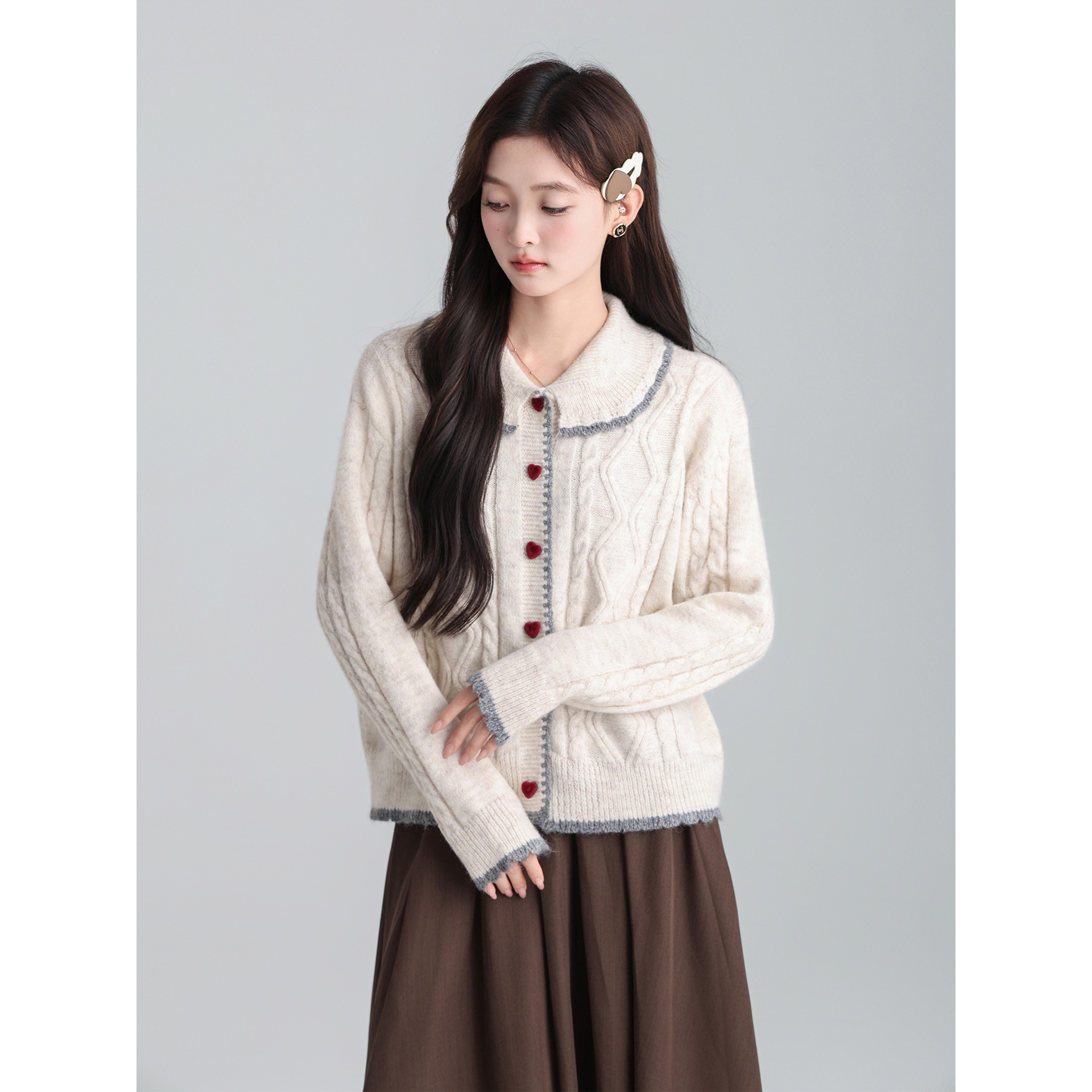 杏色娃娃领甜美菱格撞色针织毛衣女2025秋冬季宽松慵懒风外套上衣