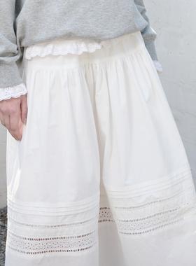 En blanc.ligne crème原创设计白色镂空花边拼接伞裙