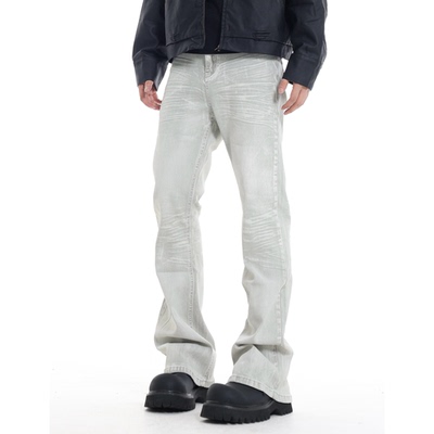 甄枚前脏染猫须弹力微喇牛仔裤