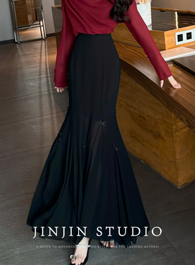 MD依诺【都市柔美】2025早春新品蝴蝶结设计感黑色高腰半身裙