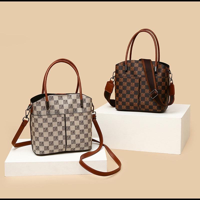 蝈蝈每日严选手提女包新款托特包印花单肩斜挎包大容量水桶包