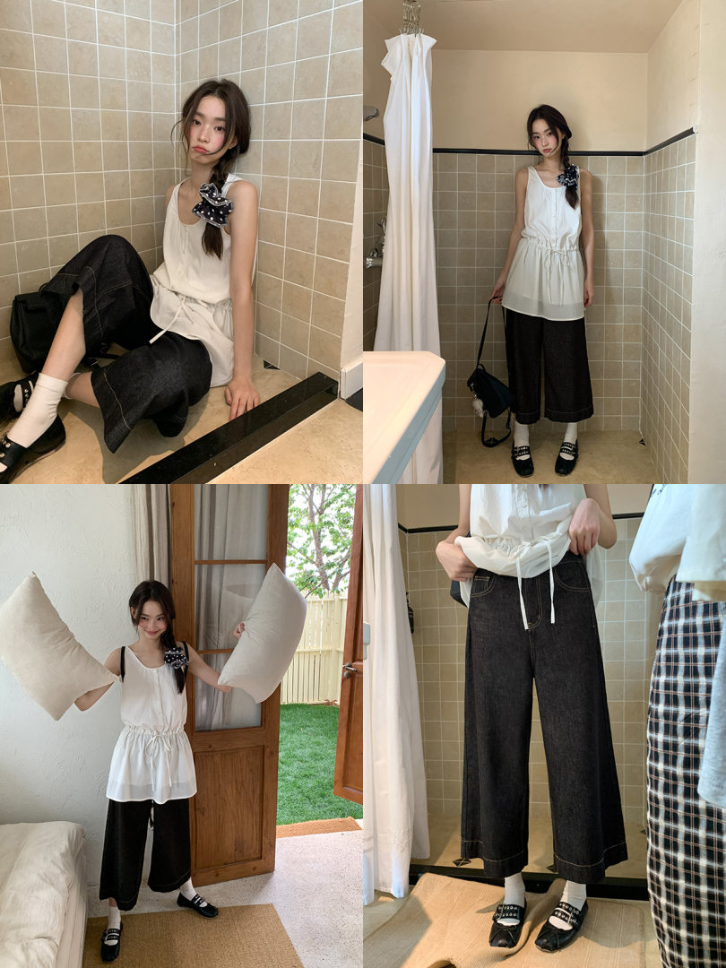 Model wearing a white sleeveless drawstring top with black wide-leg pants in multiple poses