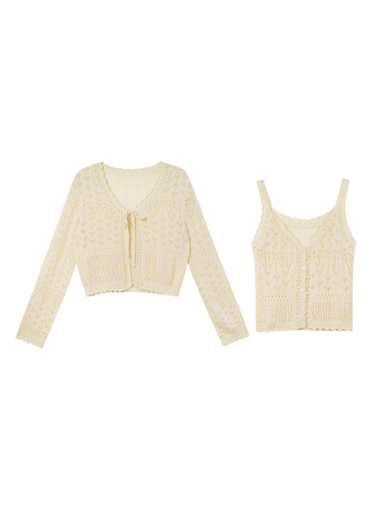 Cream knit cardigan and matching camisole set on a white background
