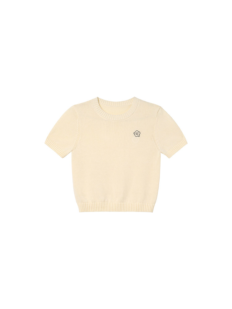 Cream short-sleeve knit top on a white background