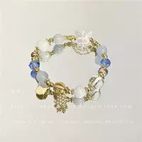 Синий браслет из бисера с бантиком