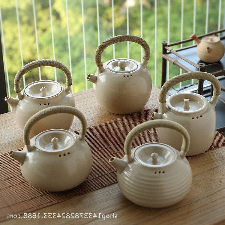 粗陶提梁烧水壶带滤孔煮茶壶白泥
