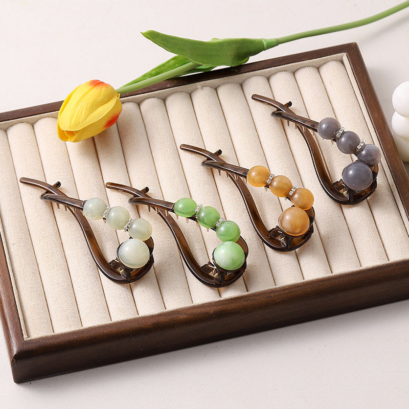 盘发夹一字带齿扭扭夹女2026新款抓夹高级珠珠水钻发夹夏天简约风