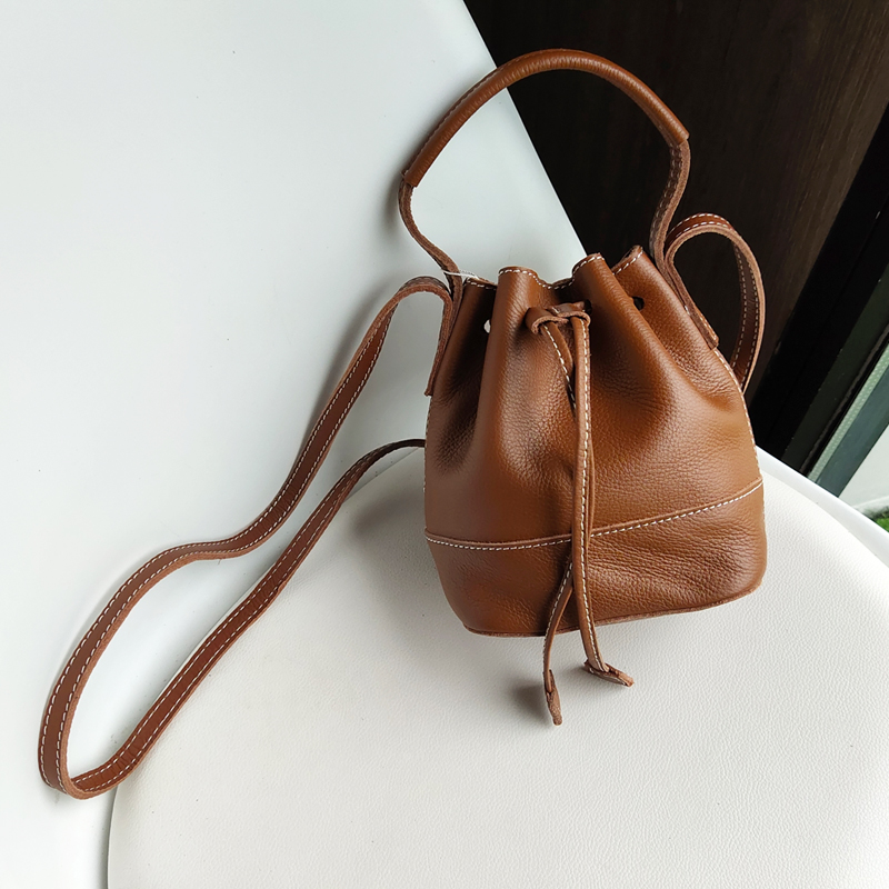 森系水桶手提单肩牛皮复古小包女