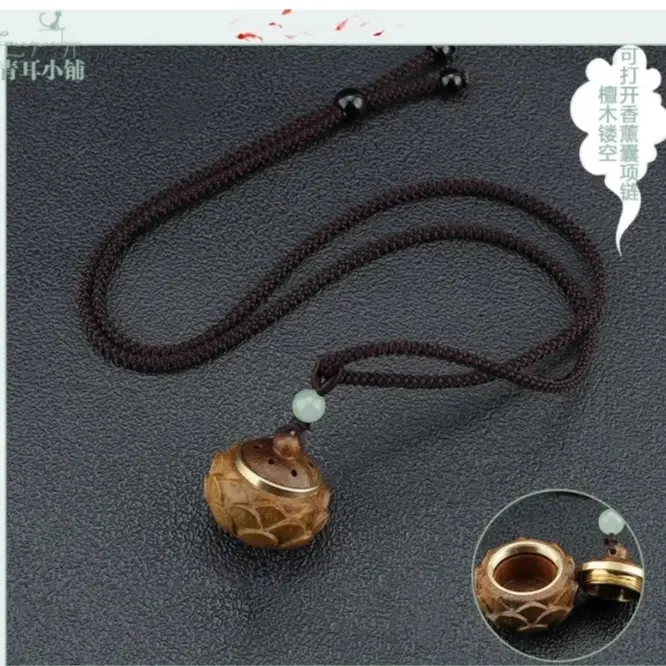 国风小清新手作绿檀木镂空可打开香薰囊长项链木质扩香毛衣链新款