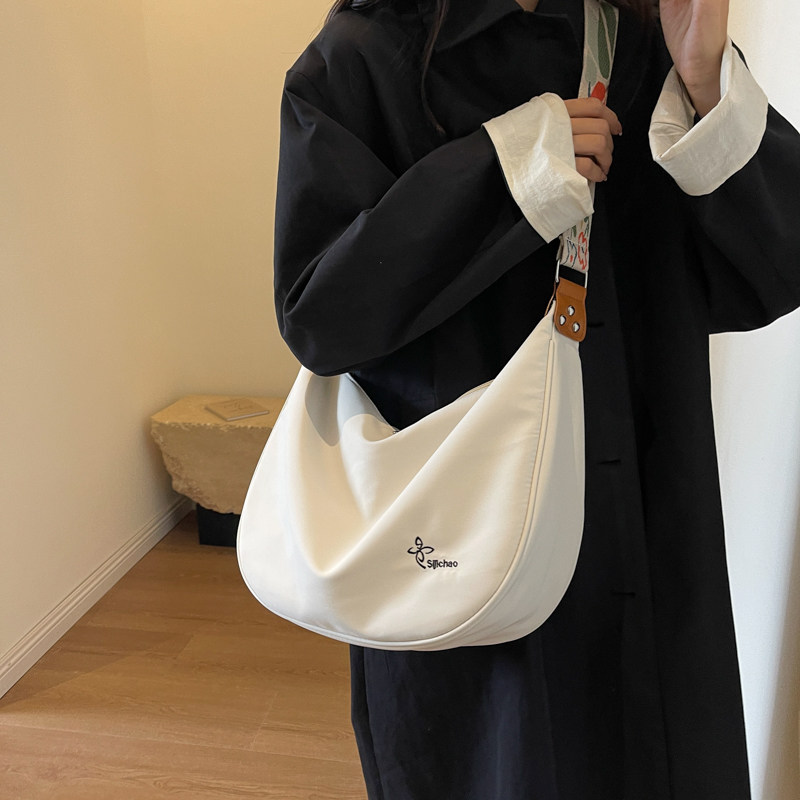 大容量布包单肩休闲斜挎饺子包