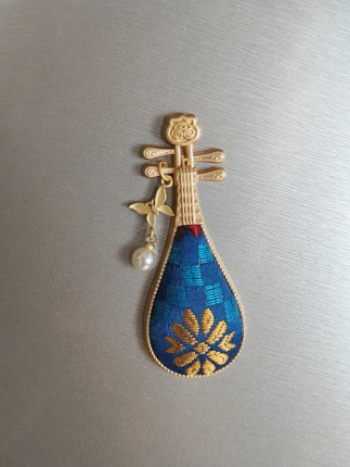 广西非遗壮锦八角几何图琵琶琴冰箱贴伴手礼，可定制。