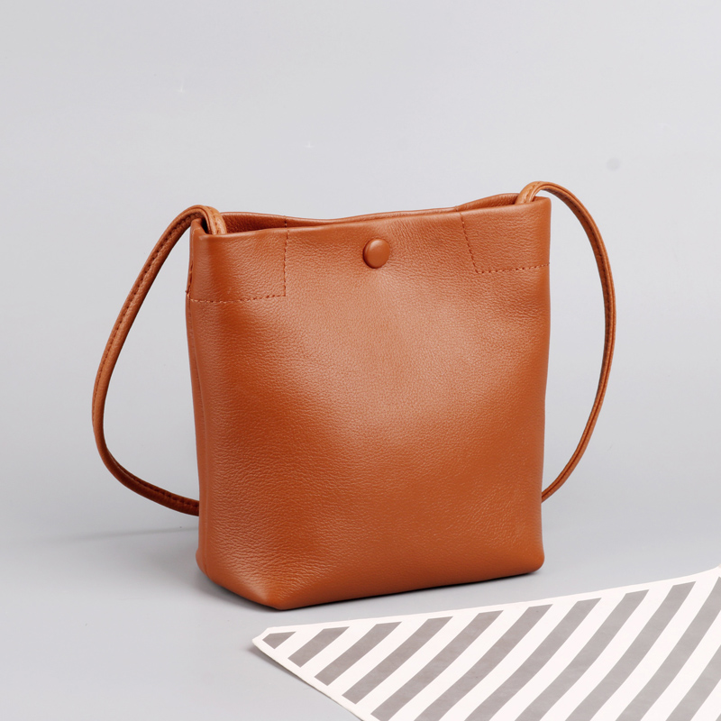 头层牛皮斜挎包真皮女包水桶包