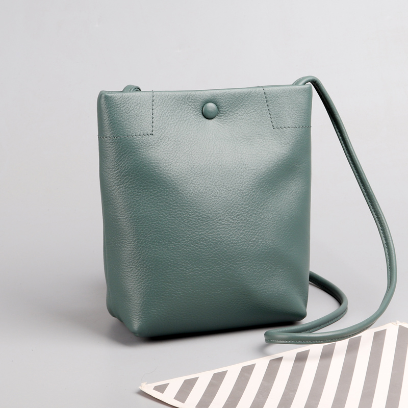 真皮女包牛皮水桶包斜挎小包包