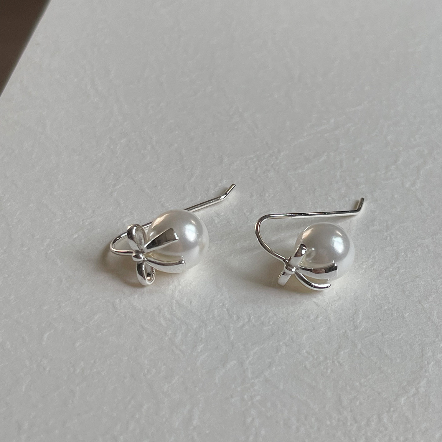 通体925银蝴蝶结白贝珠法式气质