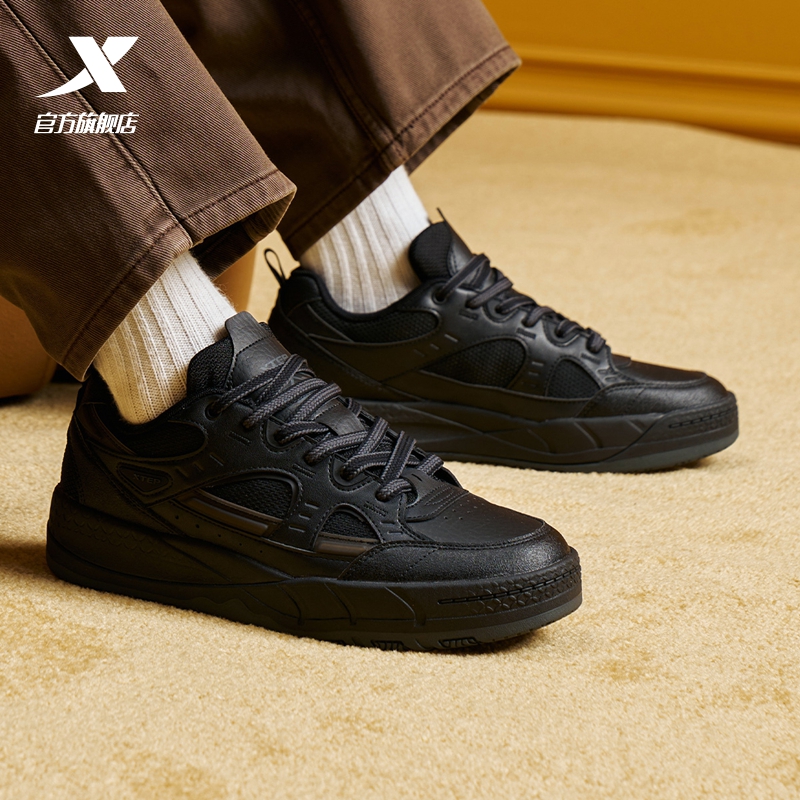 特步迷踪板鞋全黑商务鞋2025冬季新款潮流舒适百搭休闲鞋男运动鞋