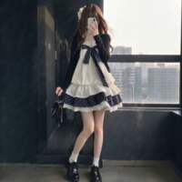 A petite student in the school style wears a sweet two-piece outfit of a long-sleeved French cardigan and a halter dress for early autumn thumbnail 3