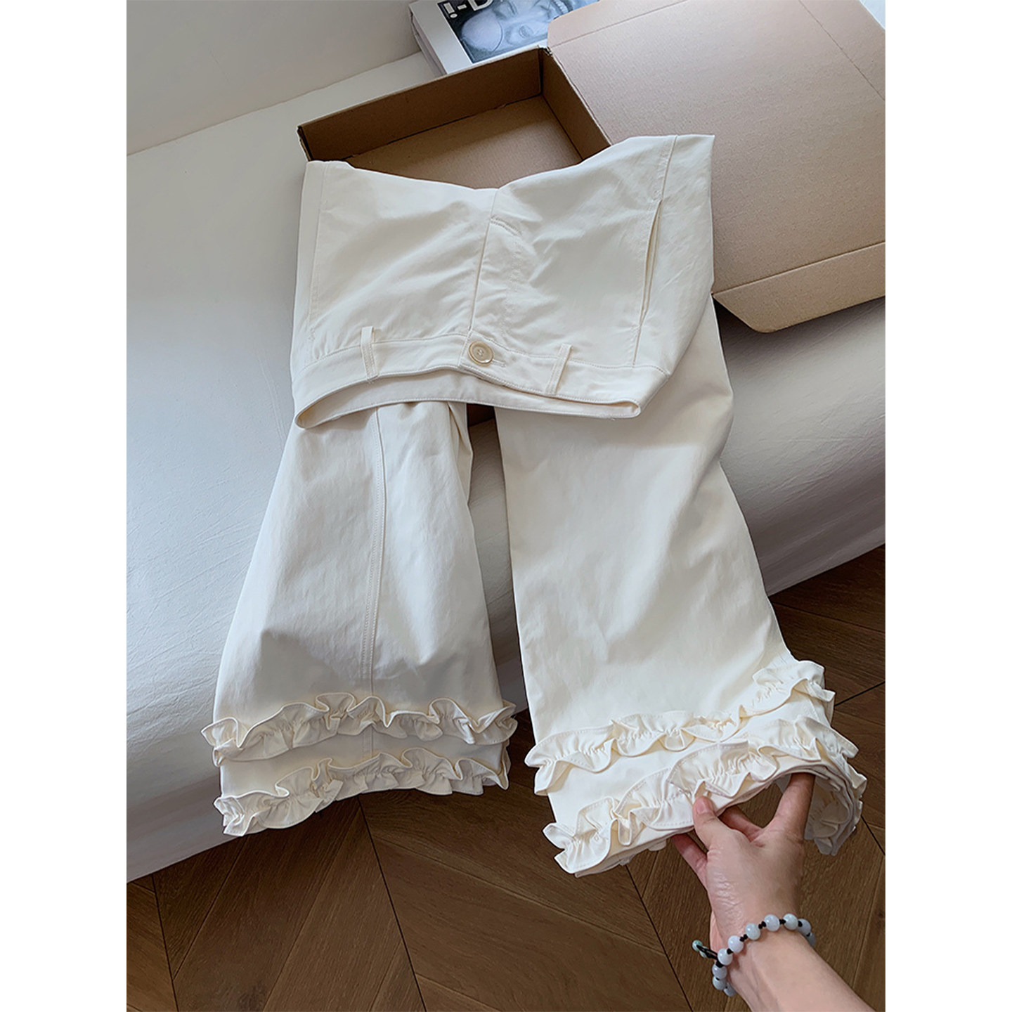 韩系木耳边裤脚白色高腰微喇休闲裤女士2025阔腿裤设计感喇叭裤子