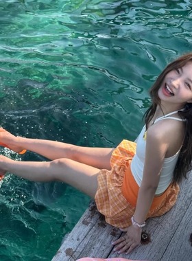 夏日绝美韩系复古橙色格纹花苞半身裙女辣妹海边度假风蛋糕短裙子