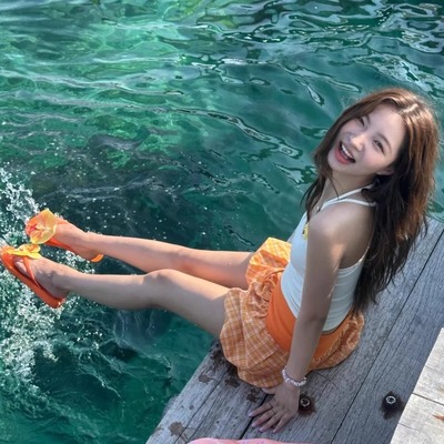 夏日绝美韩系复古橙色格纹花苞半身裙女辣妹海边度假风蛋糕短裙子