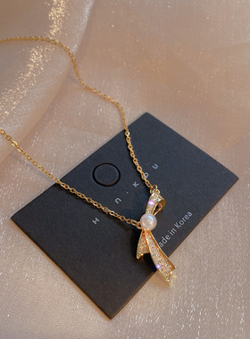 日系可爱蝴蝶结吊坠女项链2026年新款潮简约时尚仿珍珠锁骨链颈链