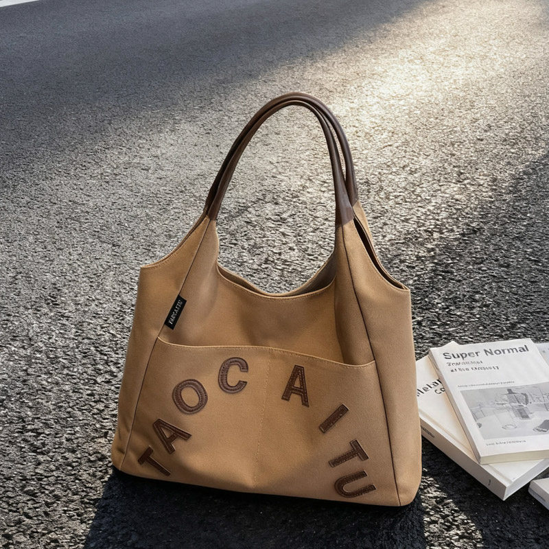 帆布托特包大容量通勤女包超火放书手提袋单肩休闲上班包包女布包,箱包皮具/热销女包/男包,时尚帆布包,淘宝优惠券,粉丝福利购,淘宝优惠卷