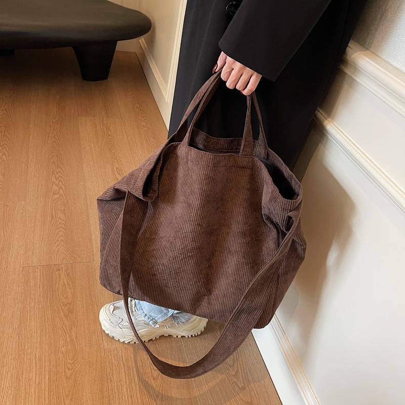 帆布包女手提托特包大容量简约通勤百搭学生放书单肩斜挎包慵懒风