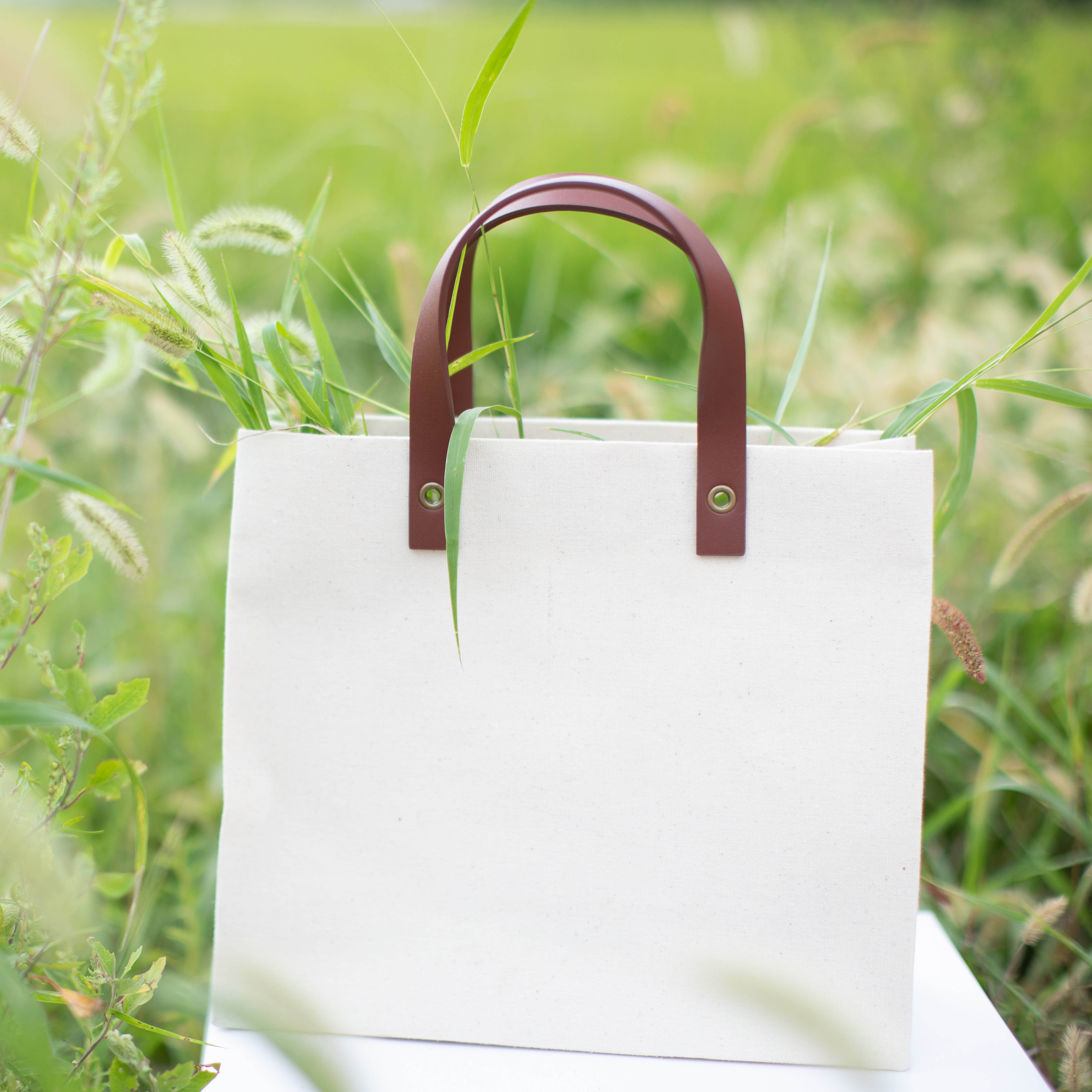 节日礼品袋手提定制高档装帧布袋小众原创设计高级包装商务伴手礼
