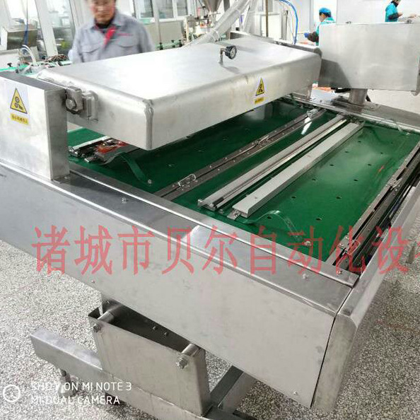 连续滚动式食品真空包装机-BE-1000型真空包装机-山东诸城贝尔