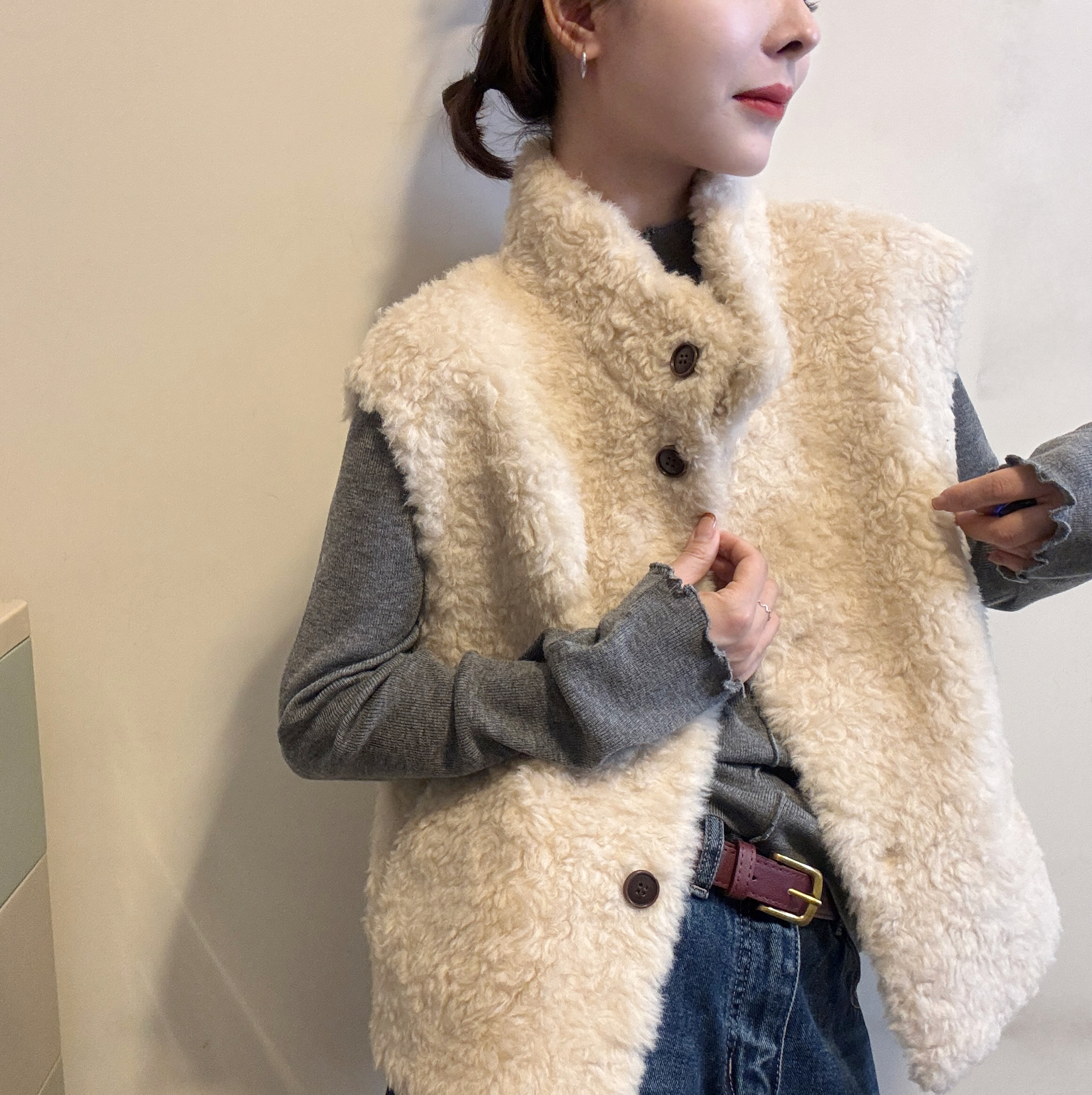 欧洲站2025秋冬新款时尚立领保暖颗粒绒无袖叠穿皮毛一体马甲外套