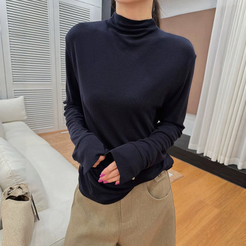 欧洲站2026秋冬时尚小立领舒适净版袖口贝壳扣开叉设计长袖T恤女