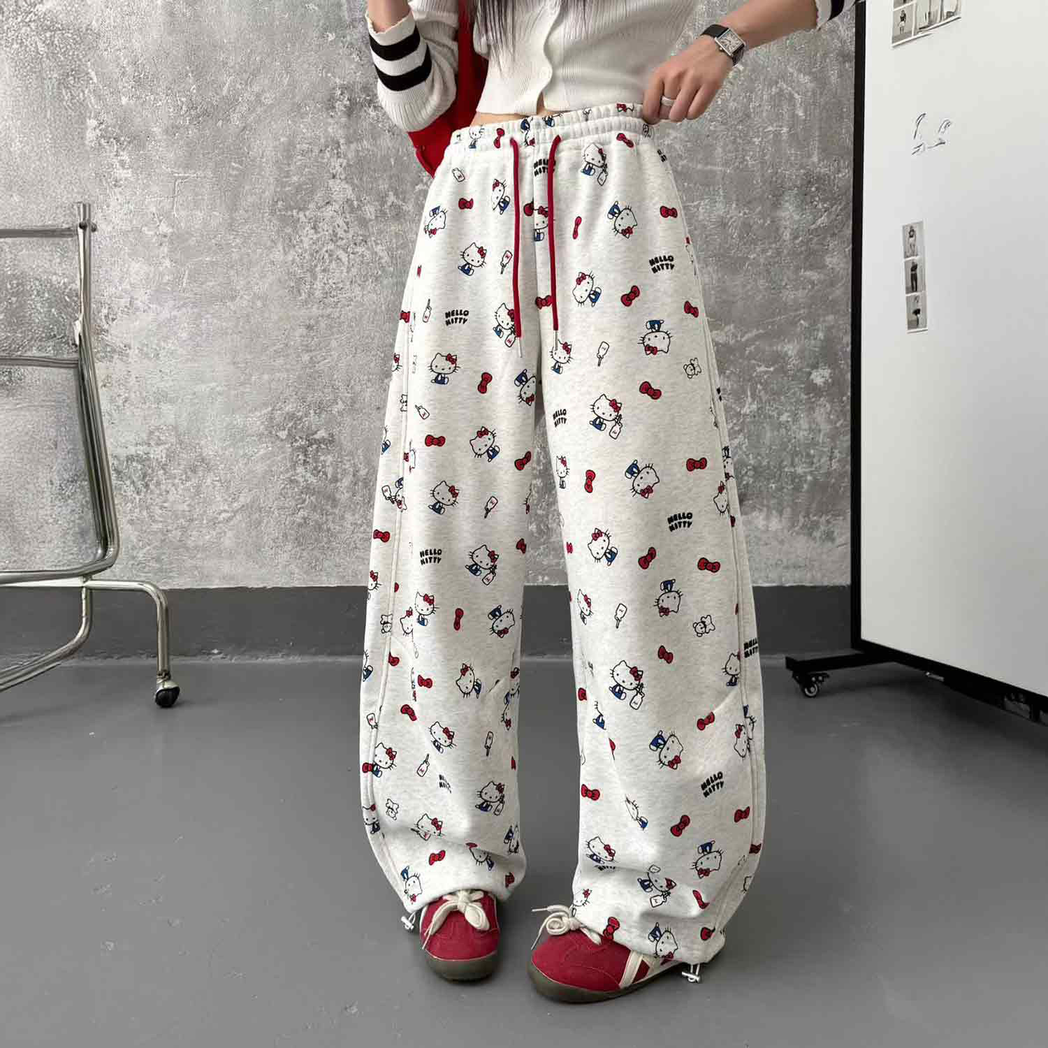 欧洲站2025冬新款韩版女士卡通KT小猫印花高腰休闲显瘦洋气弯刀