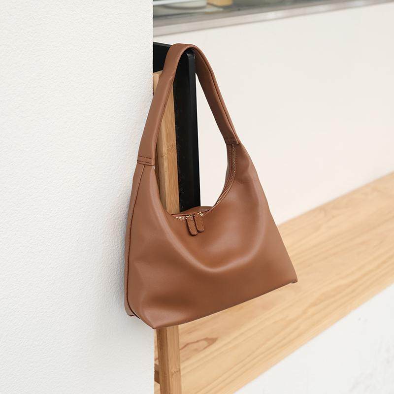 氧气种子2026春季新款 ins韩版百搭手提软皮饺子包单肩通勤托特包