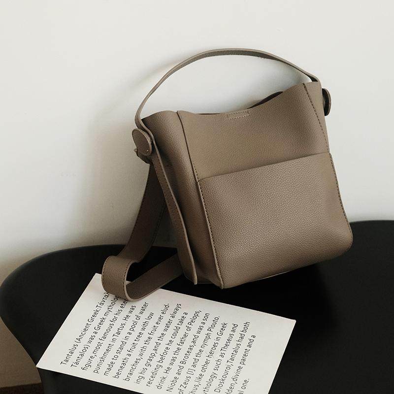 氧气种子高级感新款2025包包女包通勤包水桶包夏大容量手提单肩包