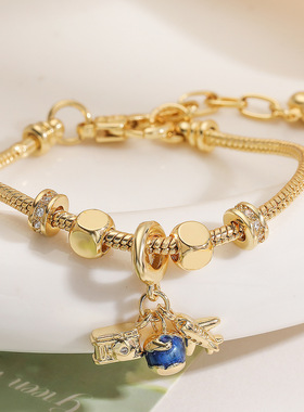 澳古铜镀18k金锆石滴油飞机旅行吊坠手链女小众清新水果