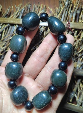 墨青籽料，墨玉籽料一种，密度2.99，钢板籽料，硬度最闪闪金银斑