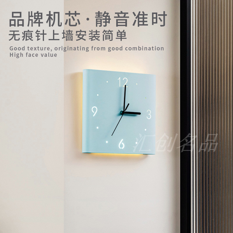 钢奶油诧寂风静音感应发光挂钟