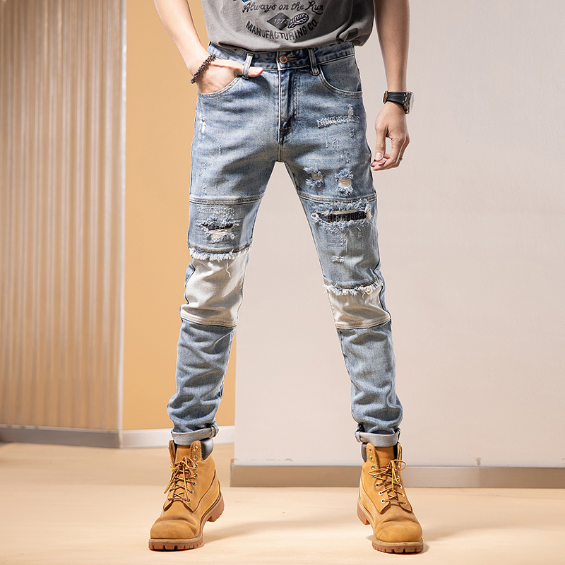 秋冬欧美牛仔裤男款弹力修身个性长裤子拼接破洞2025年小脚浅蓝