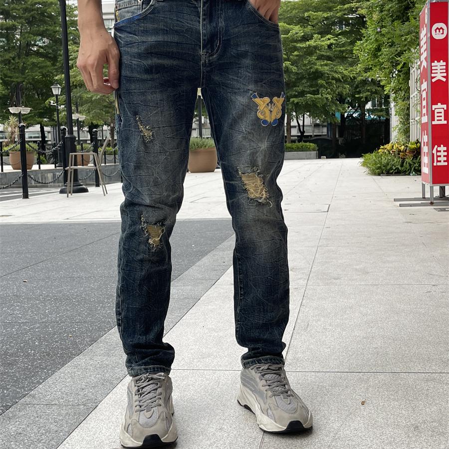 弹力牛仔裤男春秋新款破洞裤大码宽松潮流男裤港风休闲长裤青年