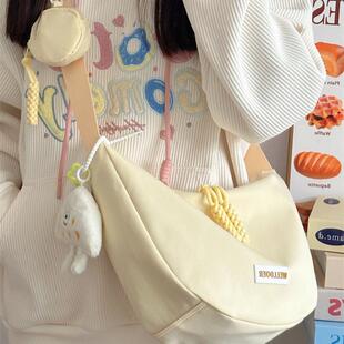 斜挎包女2025新款包包饺子包学生党大容量帆布布包百搭女包女款小