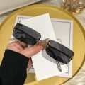 Gold Frame with Black Lenses