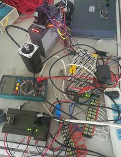 西门子200PLC控制台达伺服电机正反转步科触摸屏模拟量控制代做写