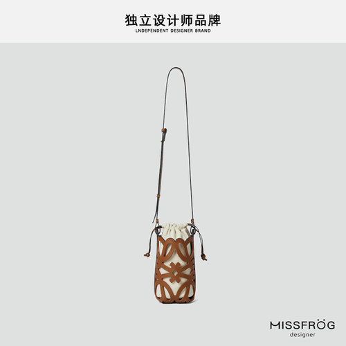 高级感复古头层牛皮镂空包圆筒包