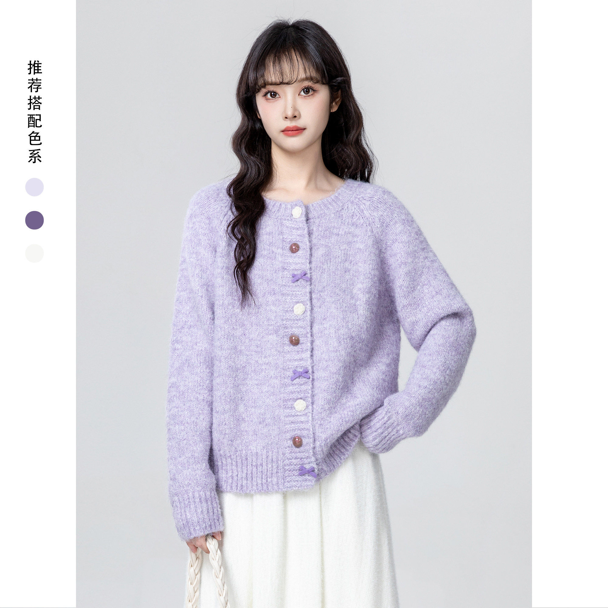 紫色圆领毛衣外套女秋冬2026冬季新款设计感纽扣加厚针织开衫上衣
