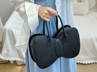 CDGGDC日本小众可爱蝴蝶结牛皮革新款手提斜挎包