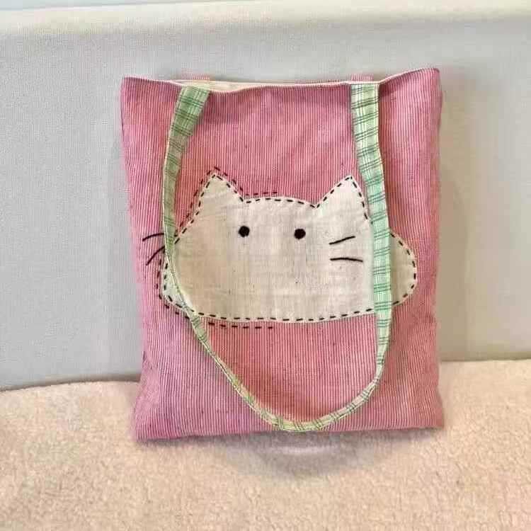 可爱卡通粉色大头猫咪帆布女包
