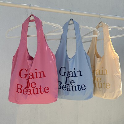 字母印花帆布包大容量单肩上课包