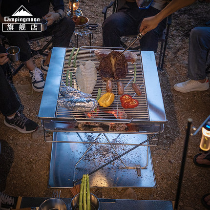 柯曼焚火台MT-055加大加厚烧烤炉不锈钢折叠烤肉炉篝火烤架柴火炉