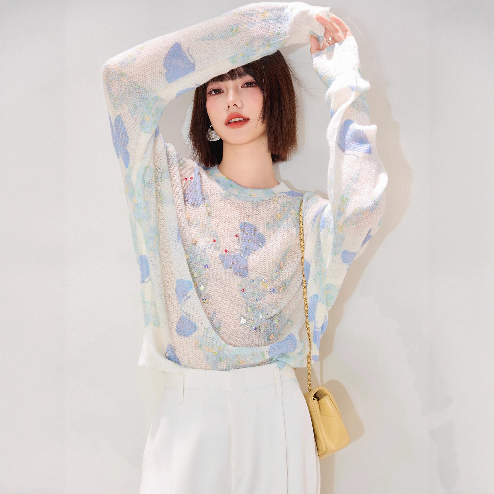 高级感薄款重工烫钻套头毛衣女秋季时尚宽松慵懒风圆领针织衫上衣